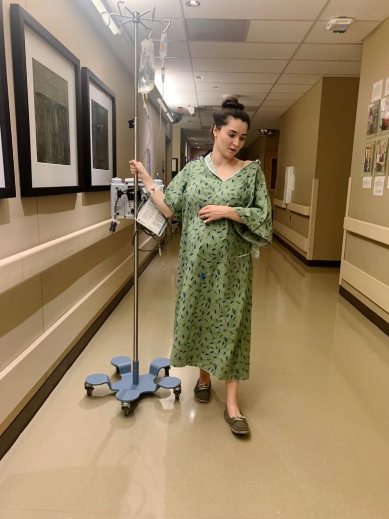Walking while in labor trying to walk through contractions and dilate more